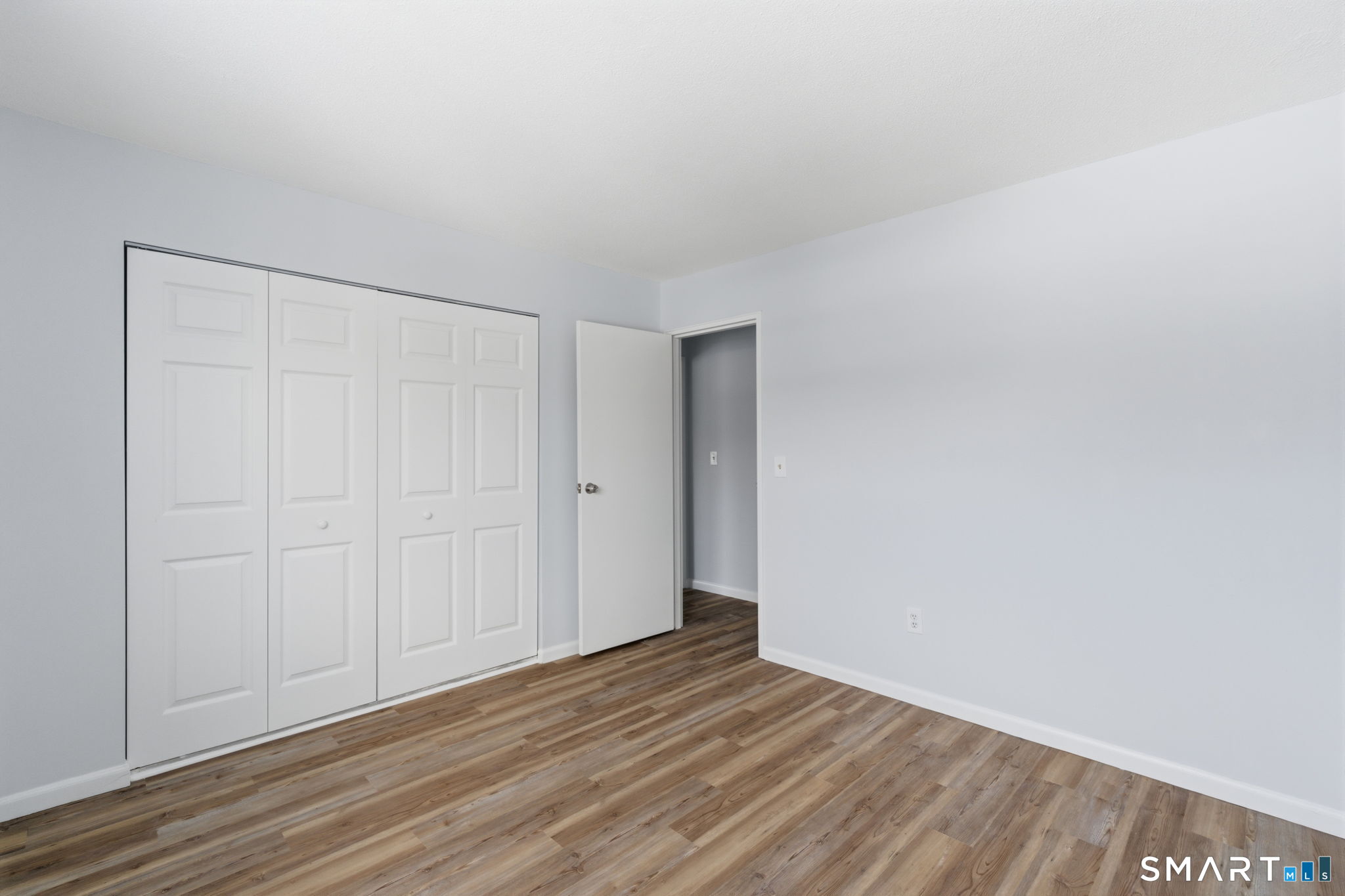 75 Balance Rock Road, Unit 20 Seymour, CT 06483 - Photo 11 of 80 a view of an empty room with wooden floor