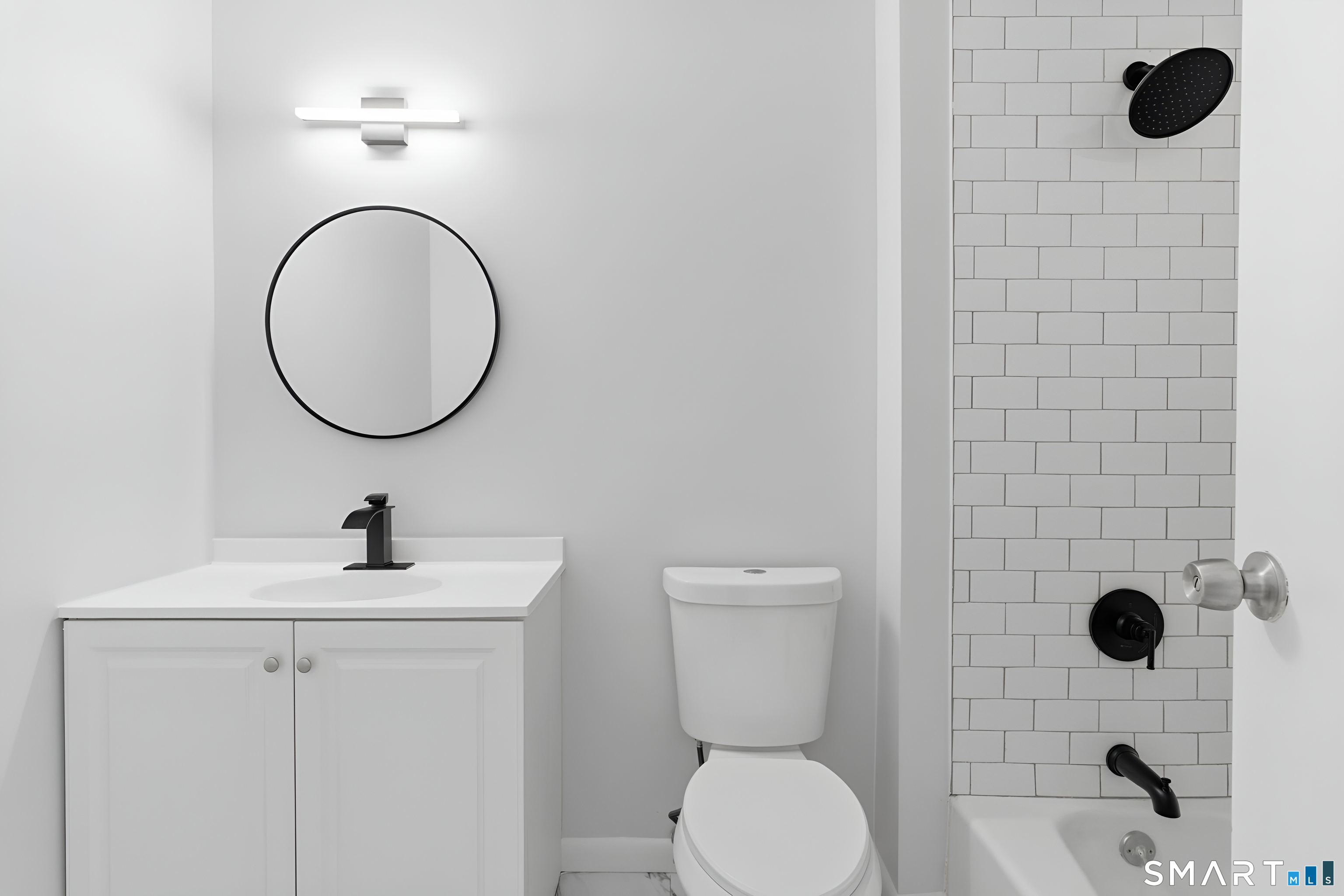 75 Balance Rock Road, Unit 20 Seymour, CT 06483 - Photo 48 of 80 a bathroom with a toilet sink and mirror