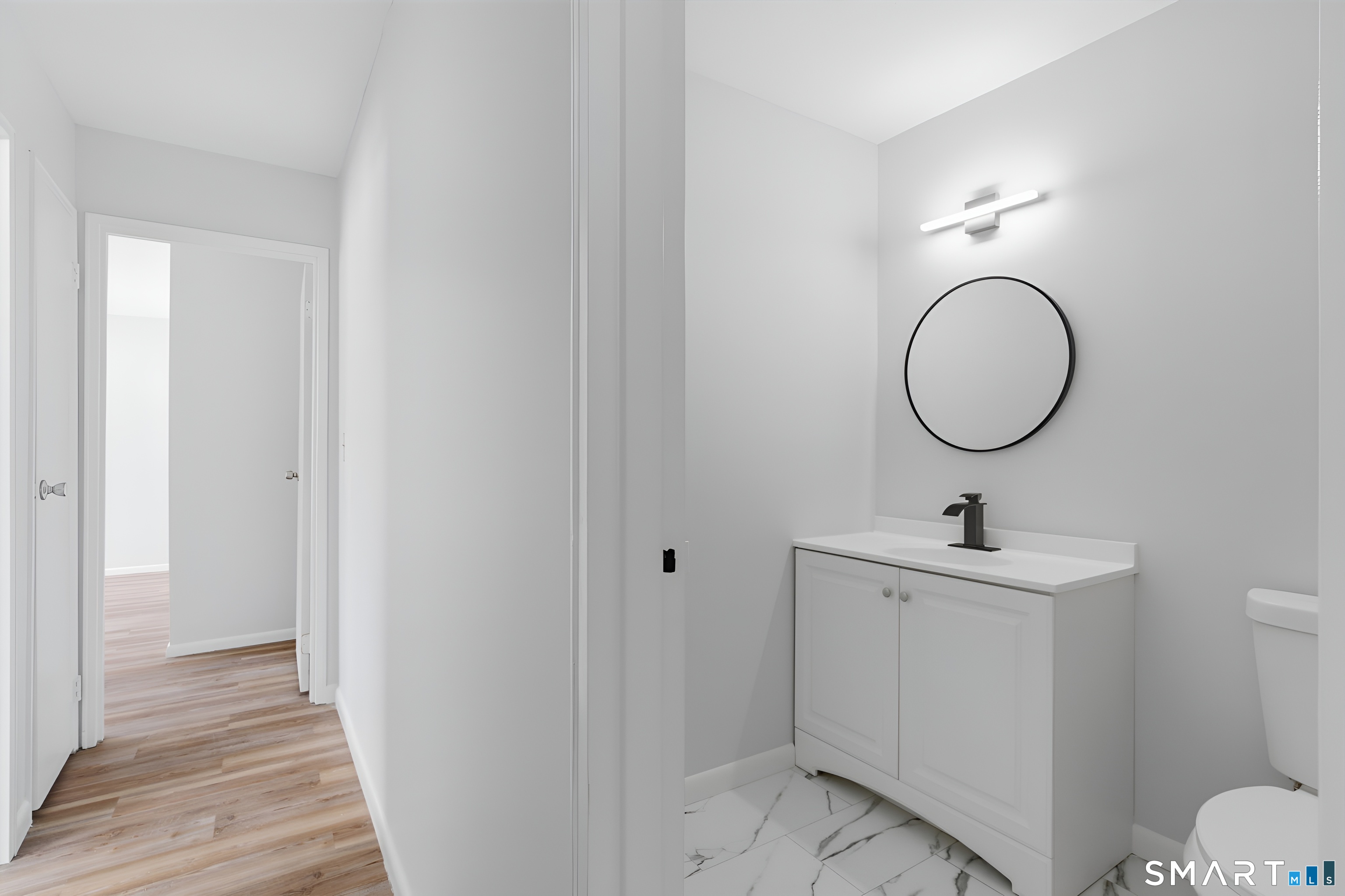 75 Balance Rock Road, Unit 20 Seymour, CT 06483 - Photo 50 of 80 a bathroom with a sink and a mirror