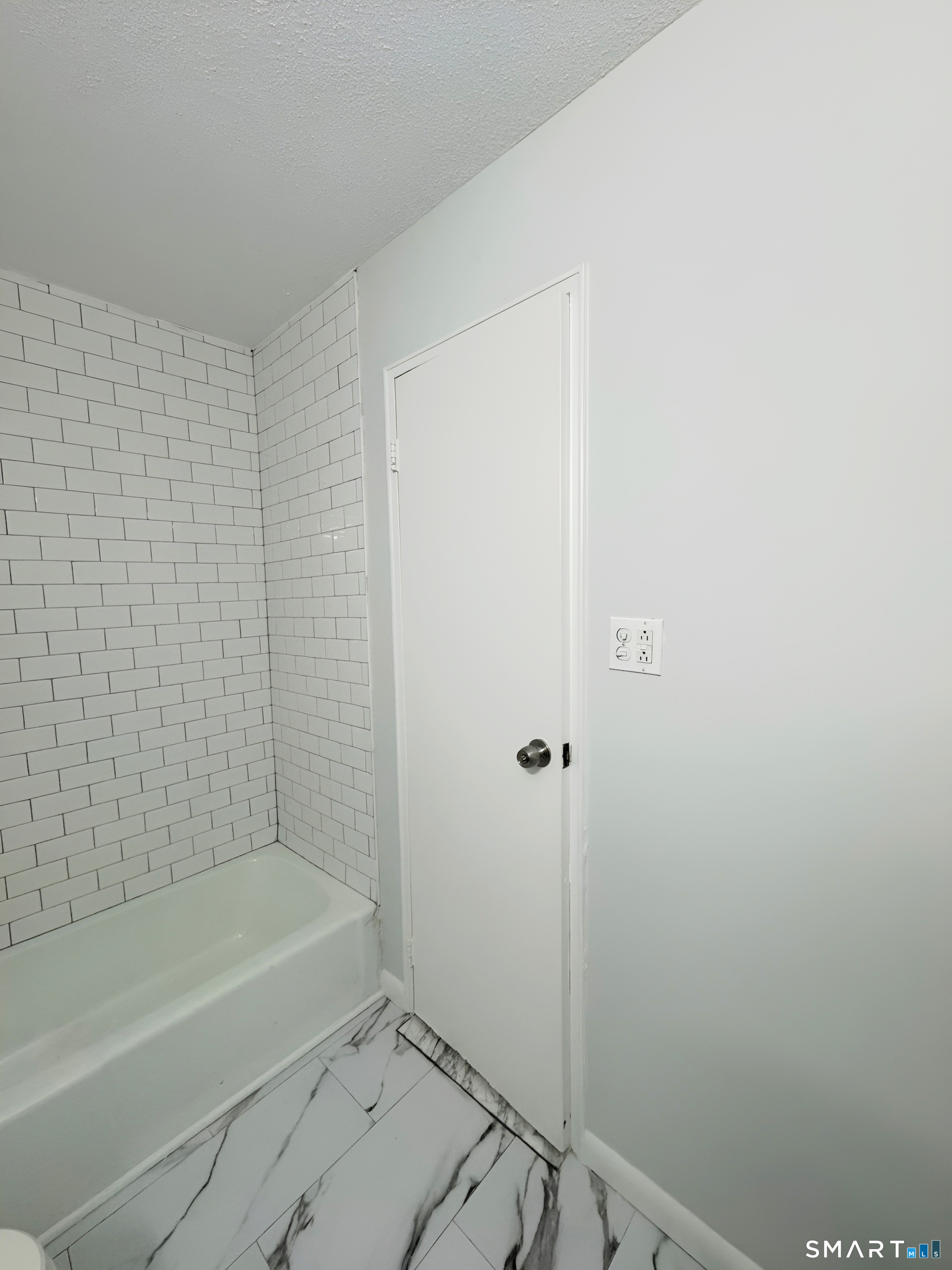 75 Balance Rock Road, Unit 20 Seymour, CT 06483 - Photo 54 of 80 a bathroom with a bathtub and a shower