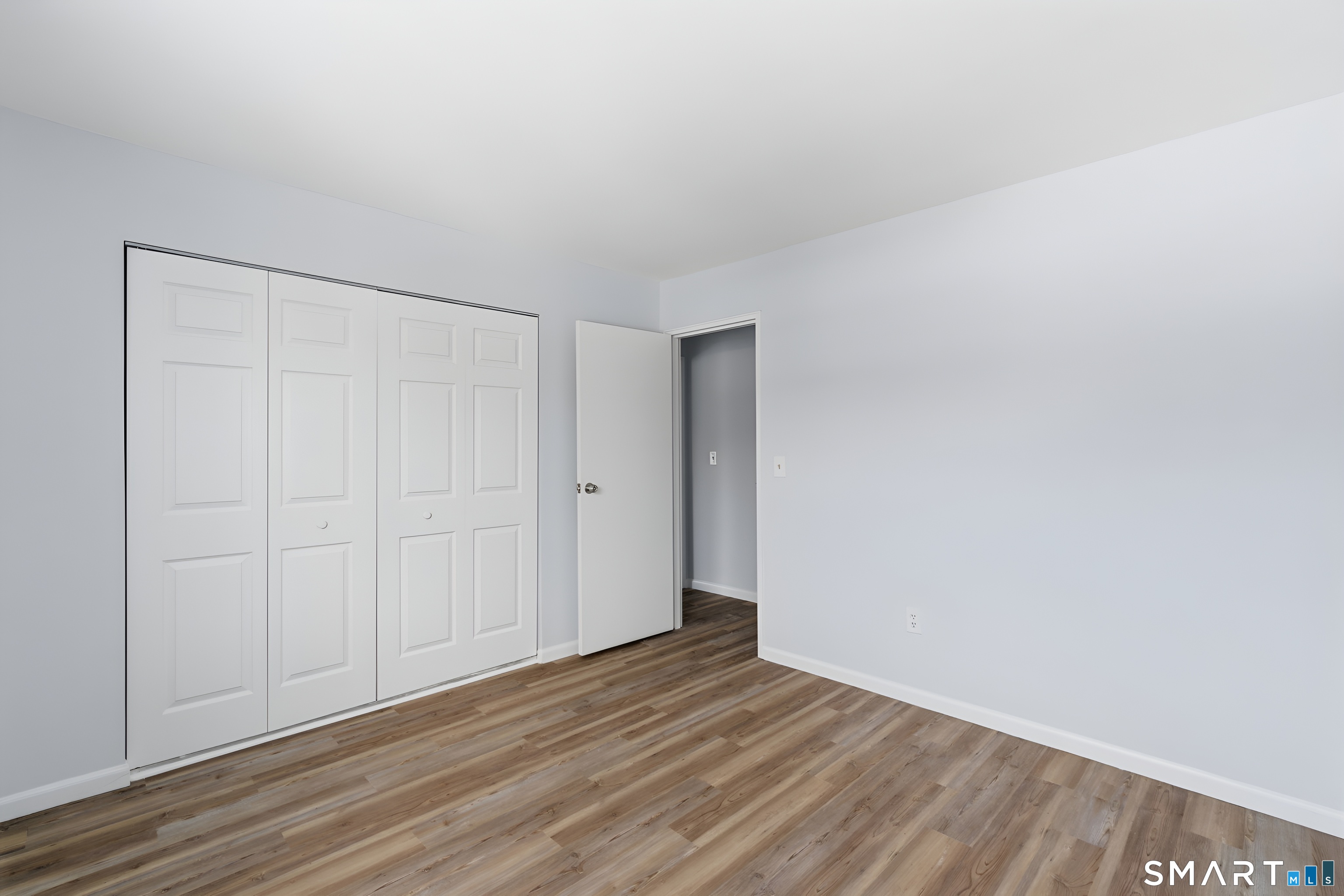 75 Balance Rock Road, Unit 20 Seymour, CT 06483 - Photo 60 of 80 a view of an empty room with wooden floor