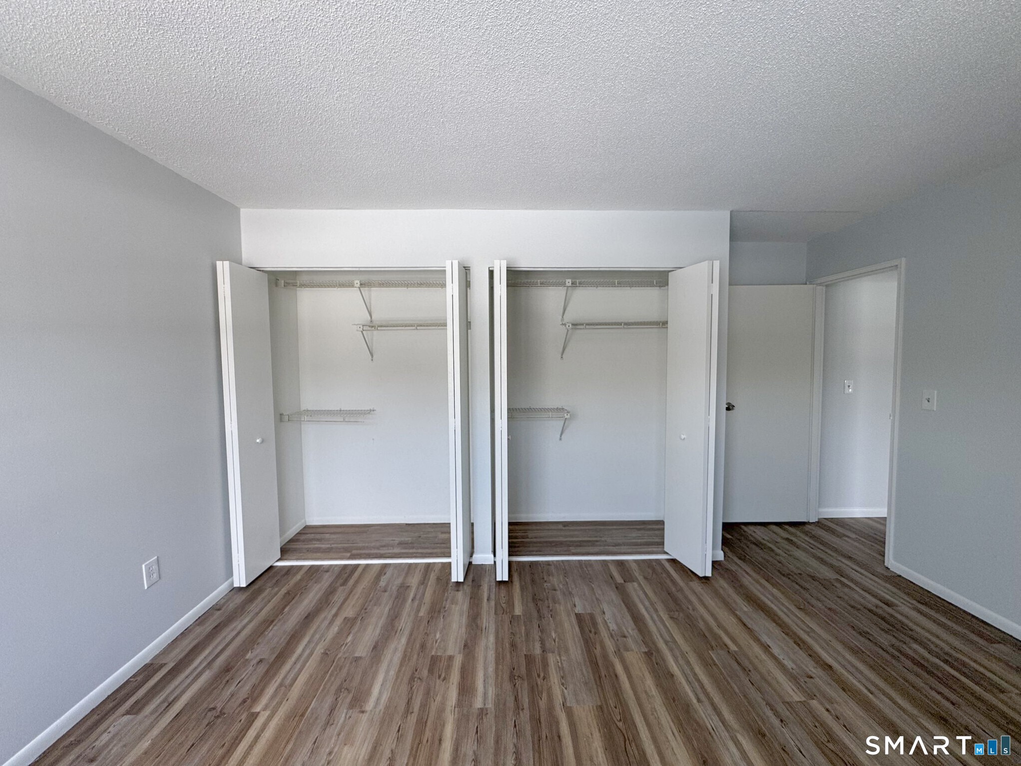 75 Balance Rock Road, Unit 20 Seymour, CT 06483 - Photo 66 of 80 wooden floor in a empty room