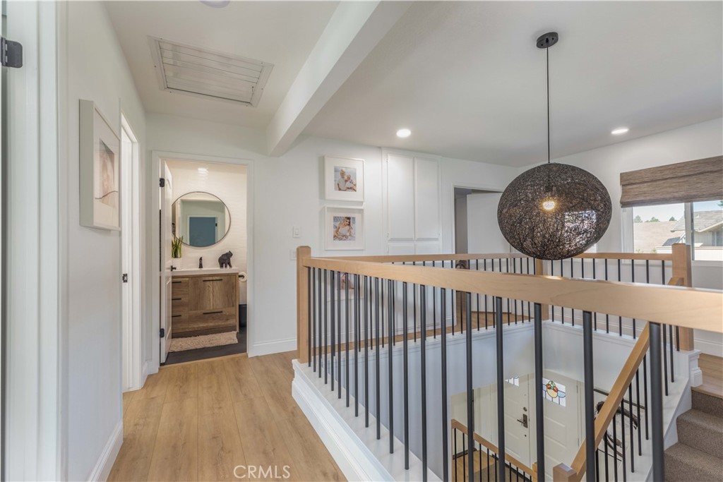 1117 Dennis Drive Costa Mesa, CA 92626 - Photo 16 of 44 a view of a hallway view with staircase