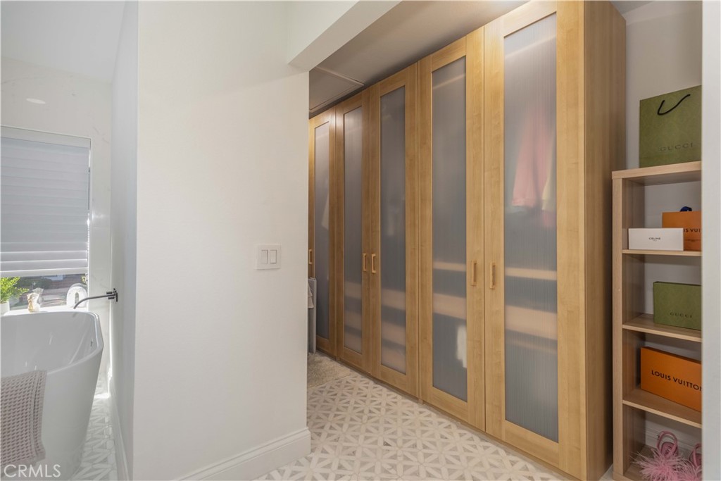 1117 Dennis Drive Costa Mesa, CA 92626 - Photo 25 of 44 a view of elevator with hallway