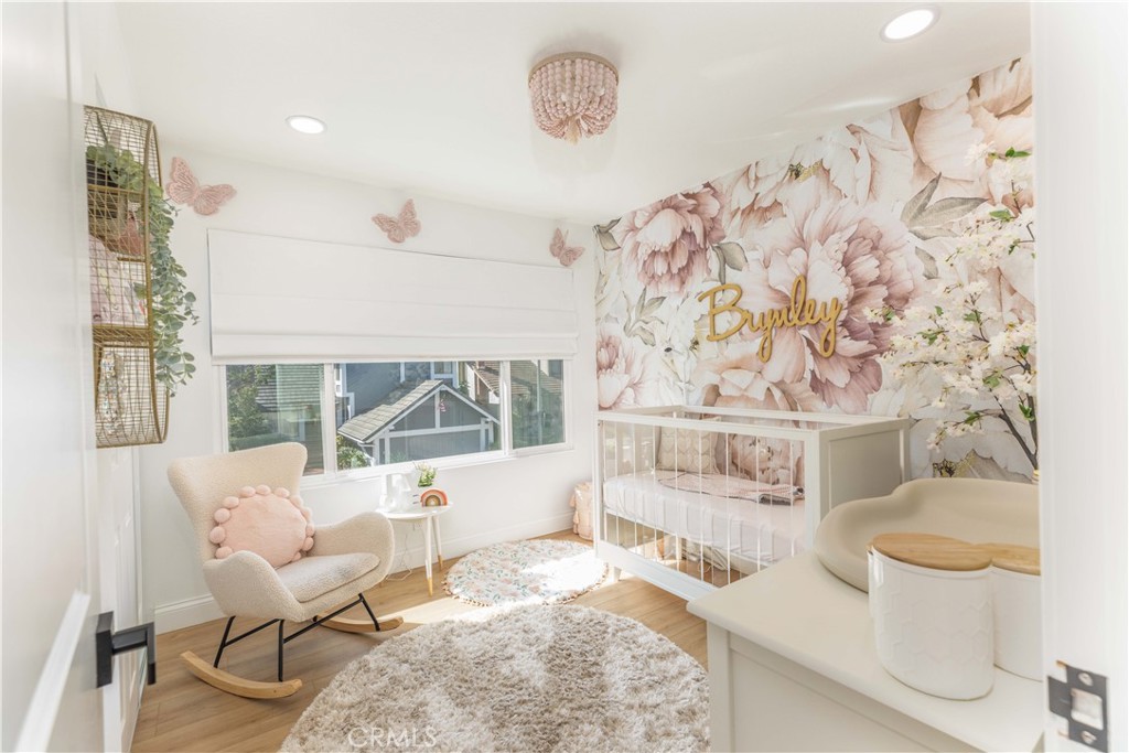 1117 Dennis Drive Costa Mesa, CA 92626 - Photo 28 of 44 a living room with furniture and a window