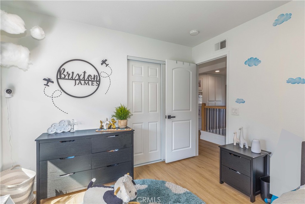 1117 Dennis Drive Costa Mesa, CA 92626 - Photo 29 of 44 a view of a room with wooden floor