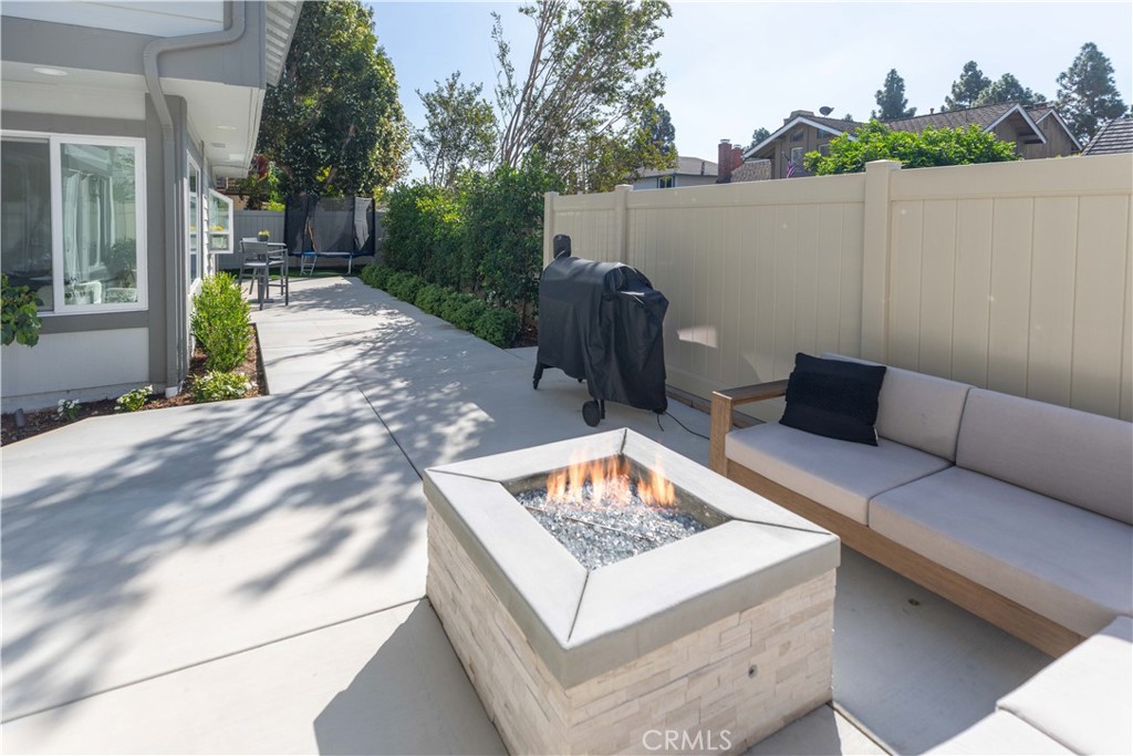 1117 Dennis Drive Costa Mesa, CA 92626 - Photo 36 of 44 a view of a backyard with sitting area