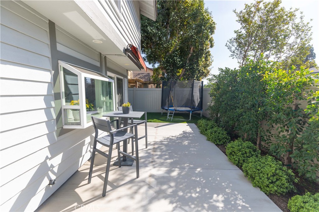 1117 Dennis Drive Costa Mesa, CA 92626 - Photo 37 of 44 a patio with yard table and chairs