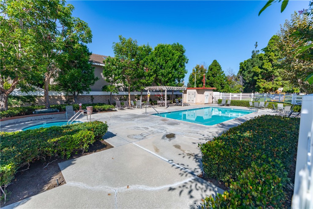1117 Dennis Drive Costa Mesa, CA 92626 - Photo 42 of 44 a view of a swimming pool with a patio