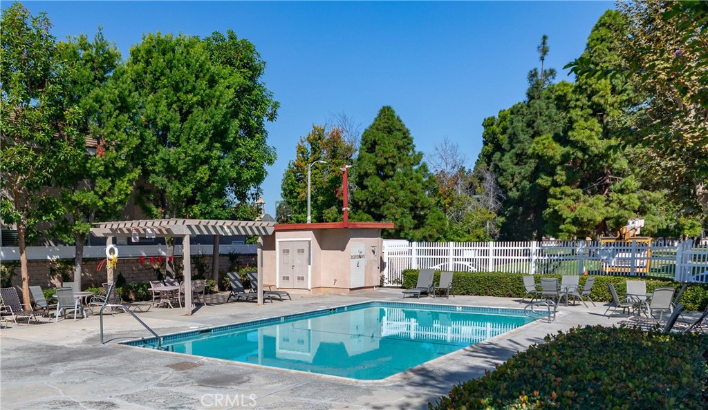 1117 Dennis Drive Costa Mesa, CA 92626 - Photo 43 of 44 a view of a house with swimming pool and sitting area