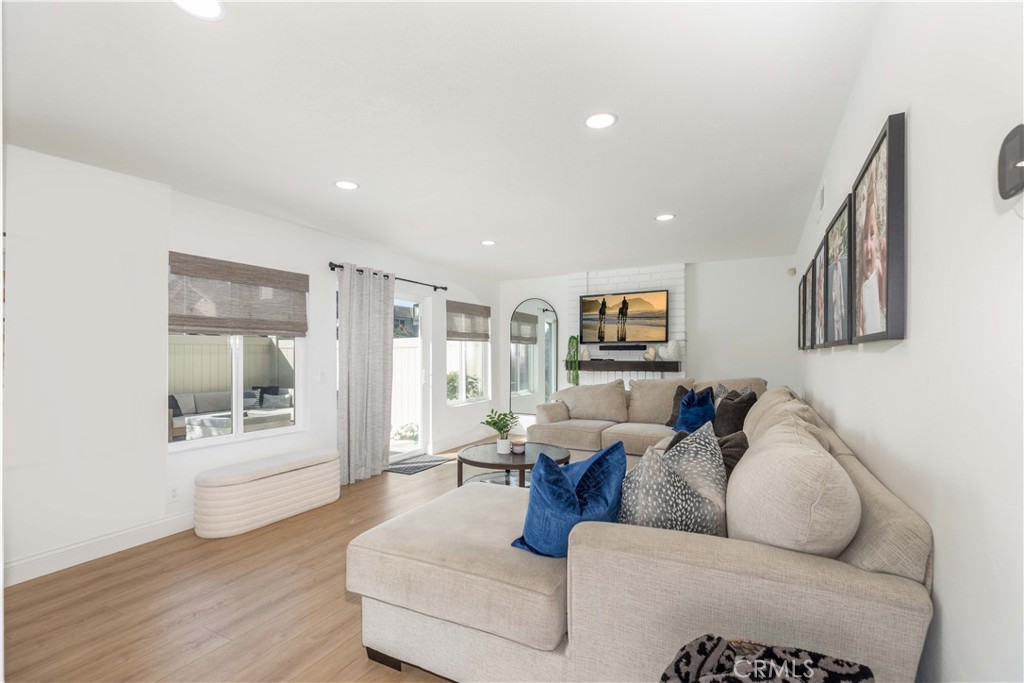 1117 Dennis Drive Costa Mesa, CA 92626 - Photo 6 of 44 a living room with furniture and wooden floor