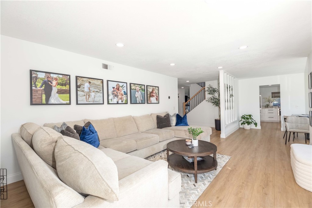 1117 Dennis Drive Costa Mesa, CA 92626 - Photo 8 of 44 a living room with furniture and wooden floor