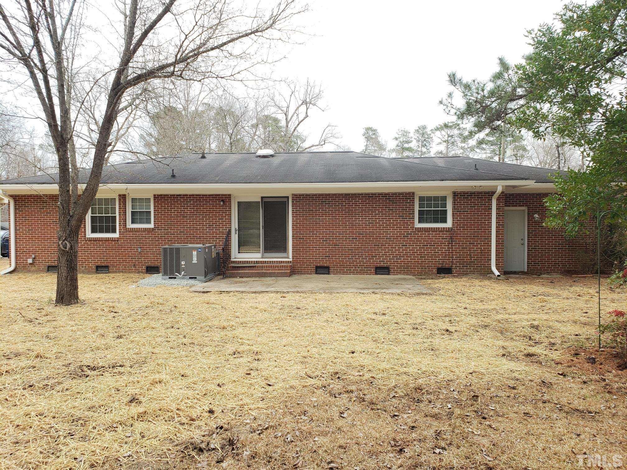 212 Longview Drive Smithfield, NC 27577 - Photo 21 of 21 a house with yard in front of it