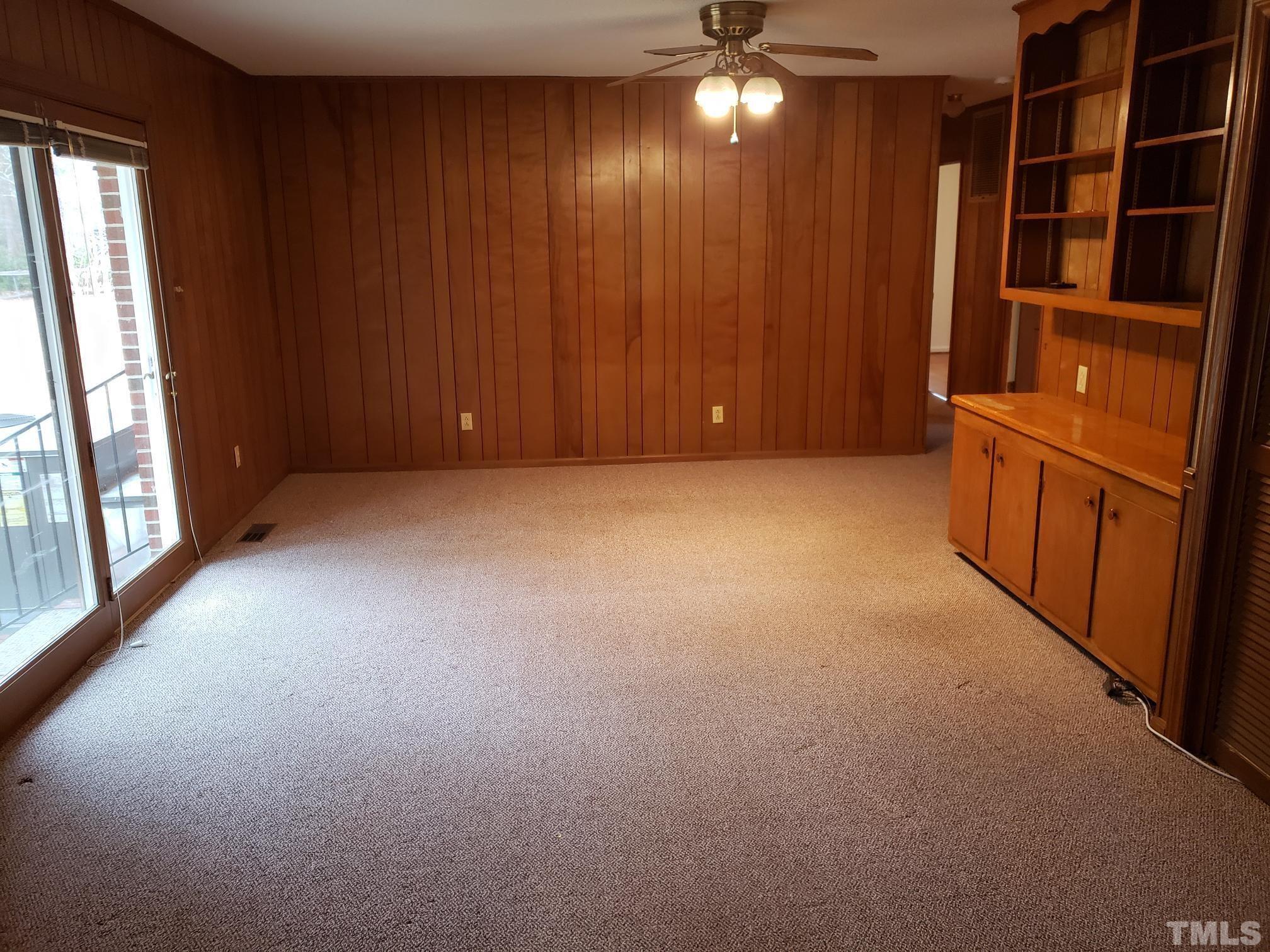 212 Longview Drive Smithfield, NC 27577 - Photo 6 of 21 a view of an empty room with a window