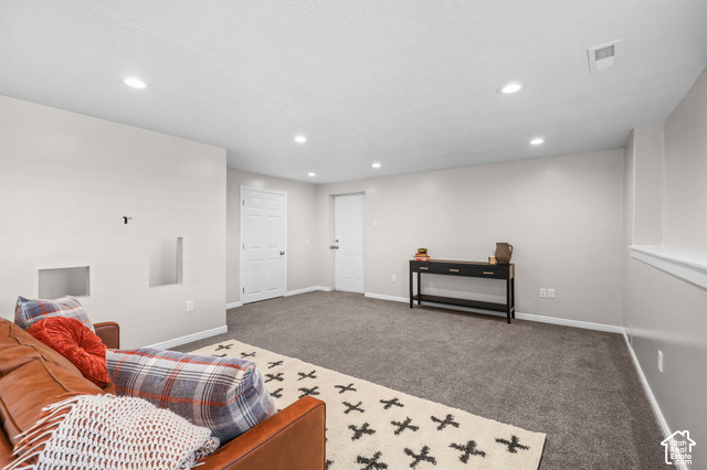 1045 West 3600th South Perry, UT 84302 - Photo 31 of 57 Recessed lighting, light gray wall paint, white trim, and gray carpet flooring
