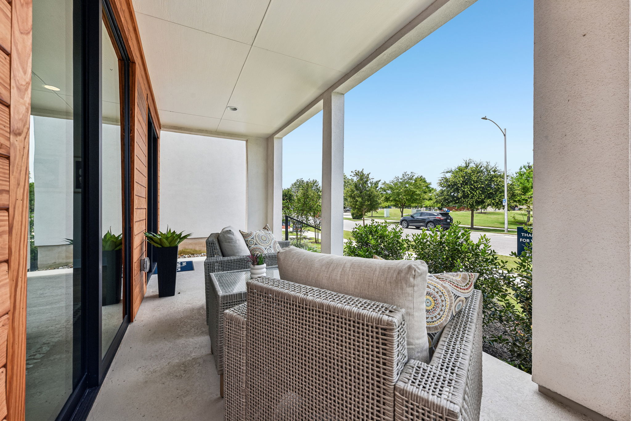 9101 Cattle Baron Path Austin, TX 78747 - Photo 37 of 40 Relax on this inviting covered patio, offering a serene outdoor retreat with views of the surrounding green space.