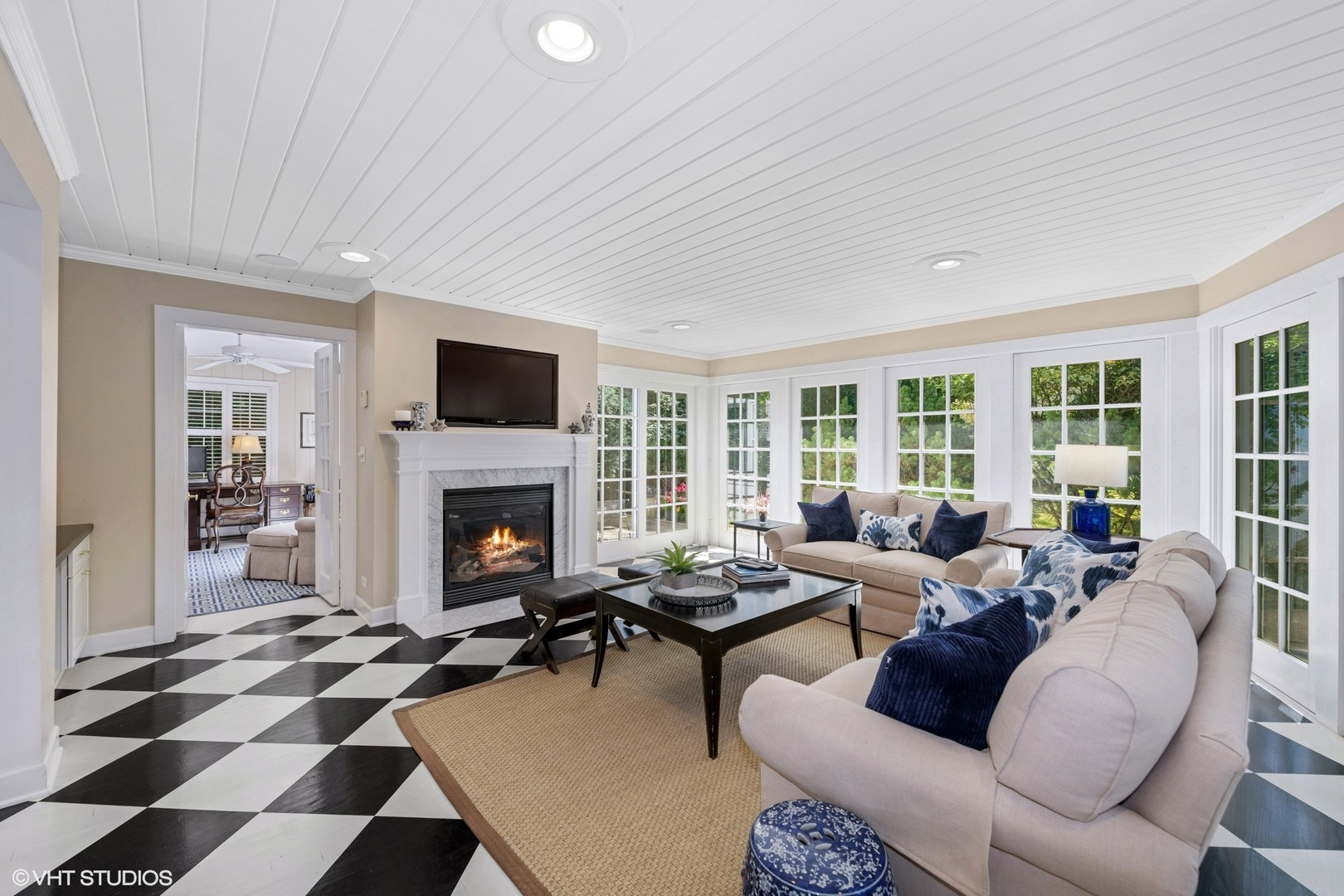 200 Sheridan Road Winnetka, IL 60093 - Photo 3 of 28 a living room with furniture a rug a fireplace and windows