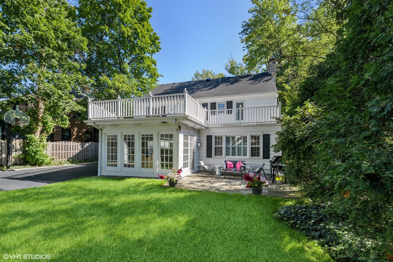 200 Sheridan Road Winnetka, IL 60093 - Photo 24 of 28 a front view of a house with garden
