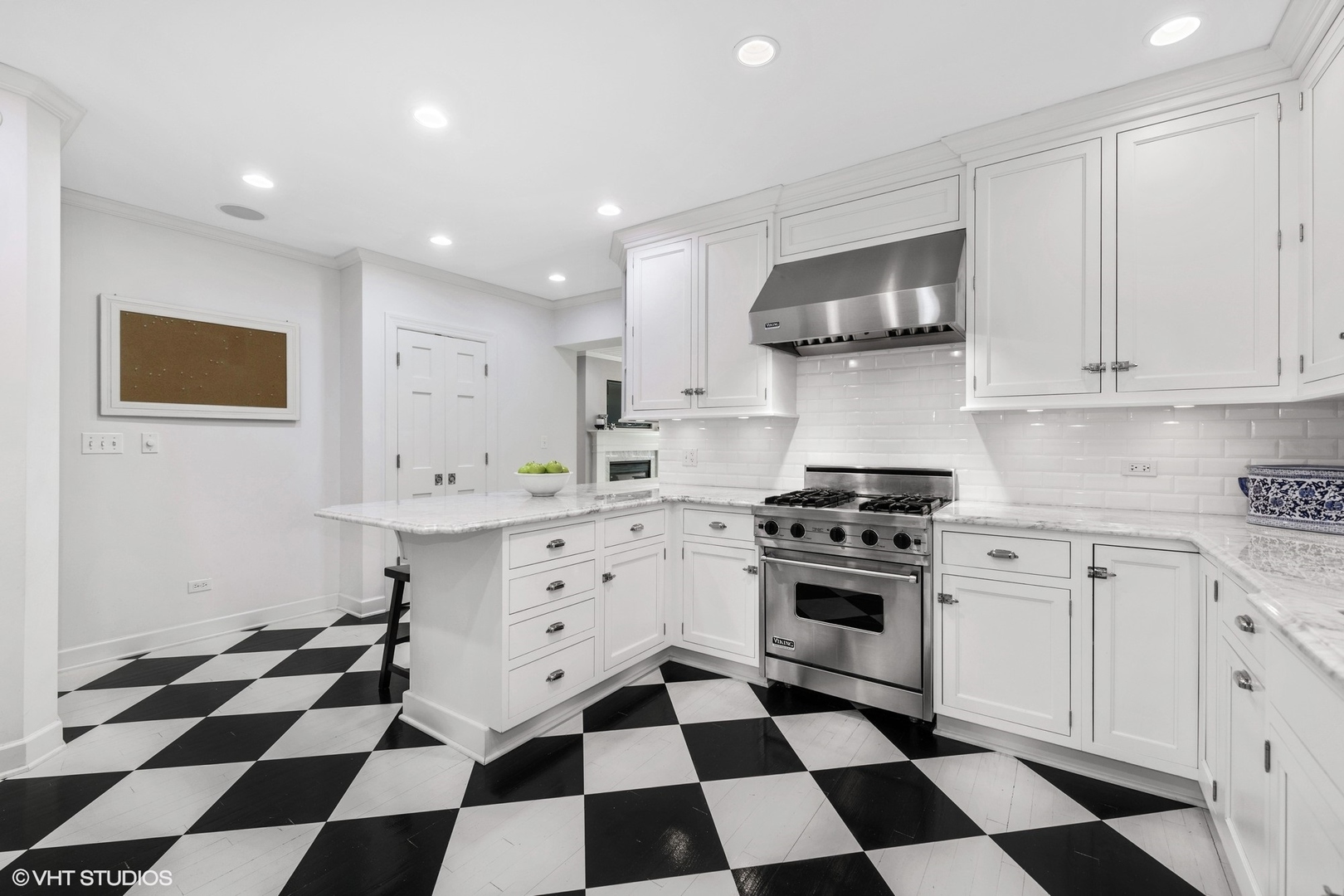200 Sheridan Road Winnetka, IL 60093 - Photo 4 of 28 a kitchen with stainless steel appliances a stove a sink and a refrigerator