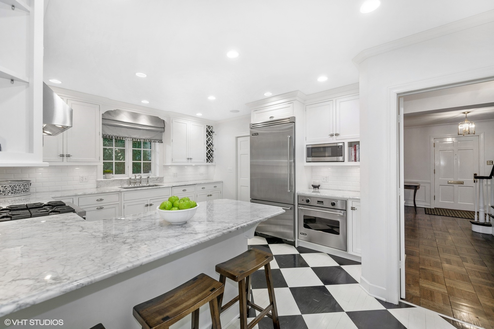 200 Sheridan Road Winnetka, IL 60093 - Photo 7 of 28 a kitchen with stainless steel appliances a refrigerator sink and stove