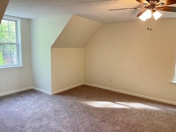 34 Kent Road Westminster, MA 01473 - Photo 13 of 27 an empty room with a window and a fan