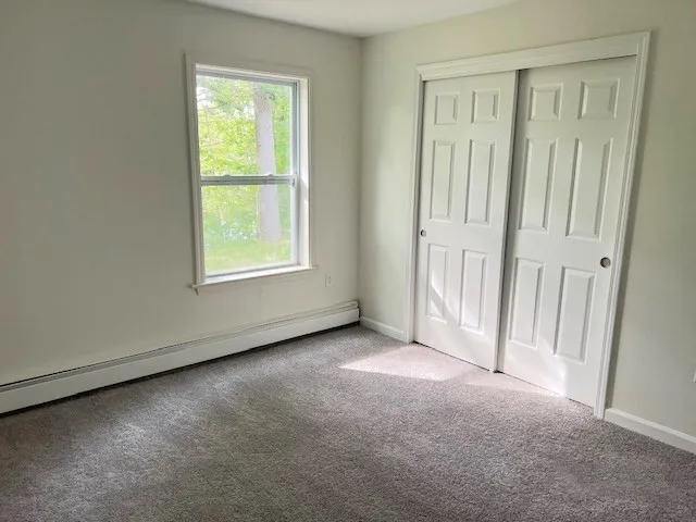 an empty room with windows