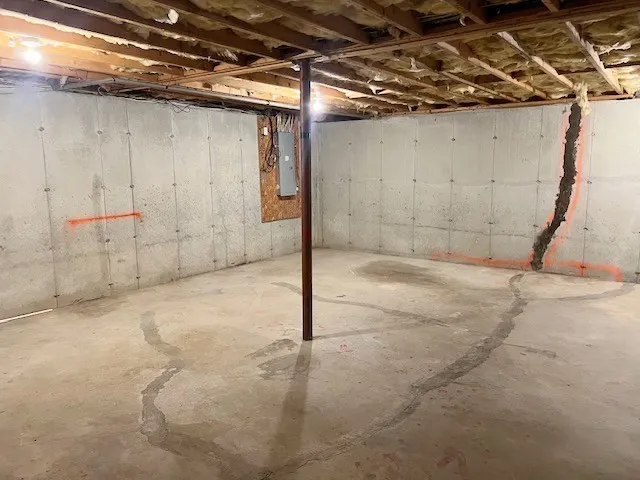 a view of a room with wooden walls