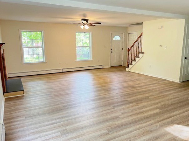 34 Kent Road Westminster, MA 01473 - Photo 9 of 27 an empty room with wooden floor and windows