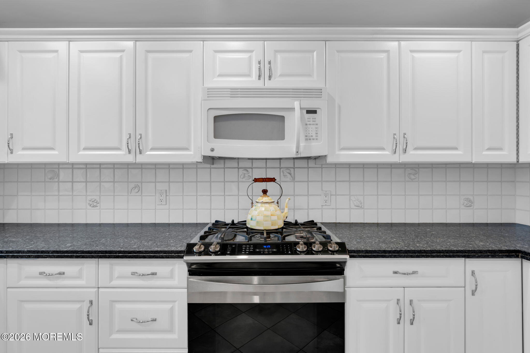 29 Green Island Road Toms River, NJ 08753 - Photo 21 of 63 a stove top oven sitting inside of a kitchen