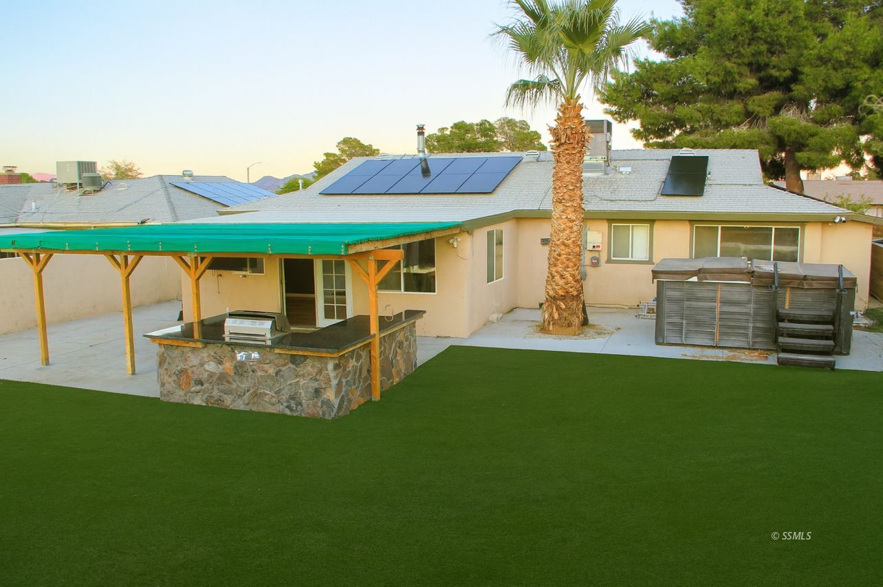 333 Traci Lane Ridgecrest, CA 93555 - Photo 24 of 30 a view of a house with backyard and a tree