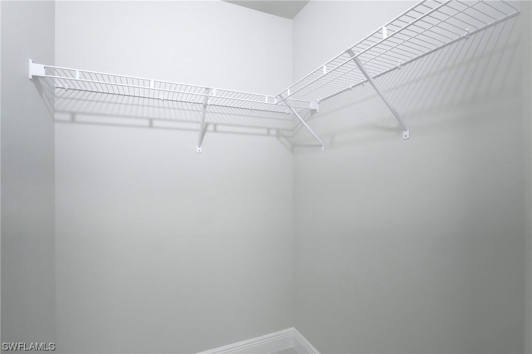 3215 46th Street West Lehigh Acres, FL 33971 - Photo 28 of 50 a view of a room with racks on the wall