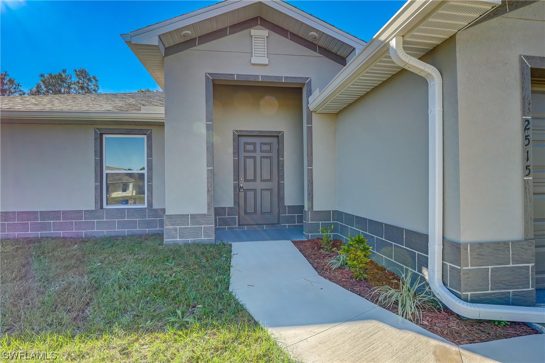 3215 46th Street West Lehigh Acres, FL 33971 - Photo 4 of 50 a view of an entryway of the house