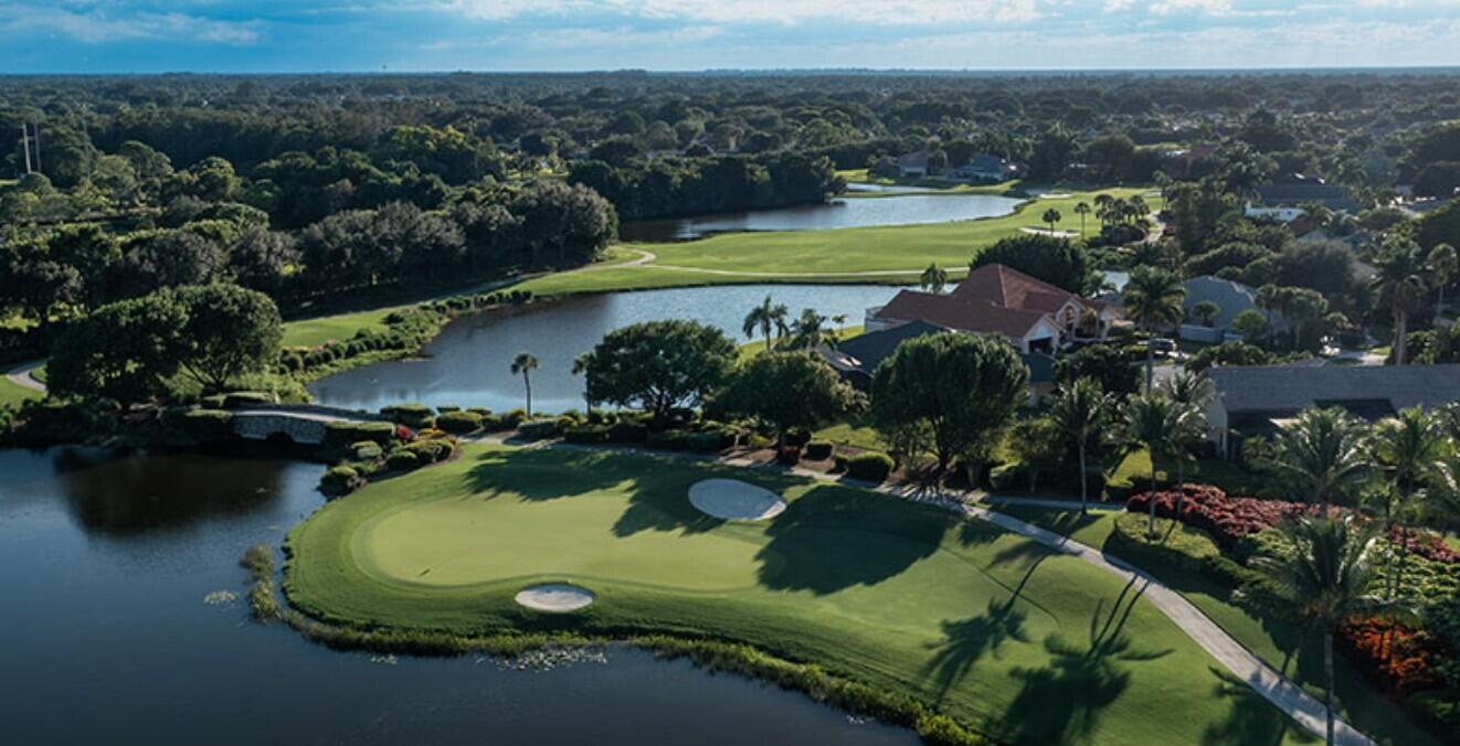 10747 Stonebridge Boulevard Boca Raton, FL 33498 - Photo 68 of 75 an aerial view of a house with a swimming pool yard and outdoor seating