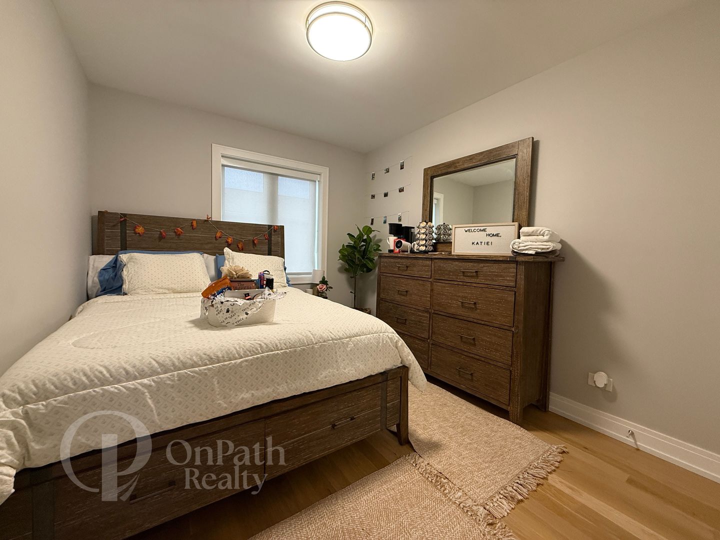 6834 West 65th Street, Unit 1 Chicago, IL 60638 - Photo 14 of 20 a bedroom with a bed and dresser