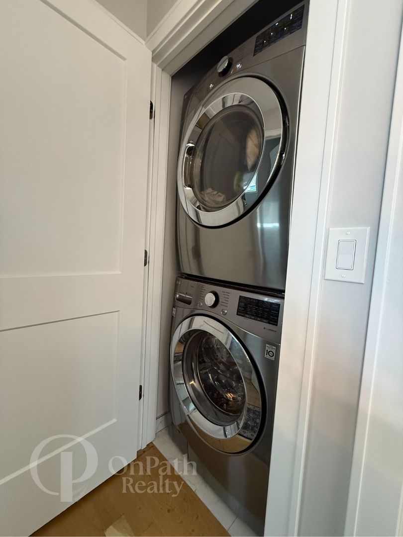 6834 West 65th Street, Unit 1 Chicago, IL 60638 - Photo 17 of 20 a utility room with dryer and washer