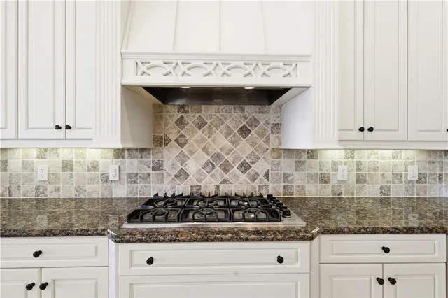 a view of a livingroom with furniture and staircase