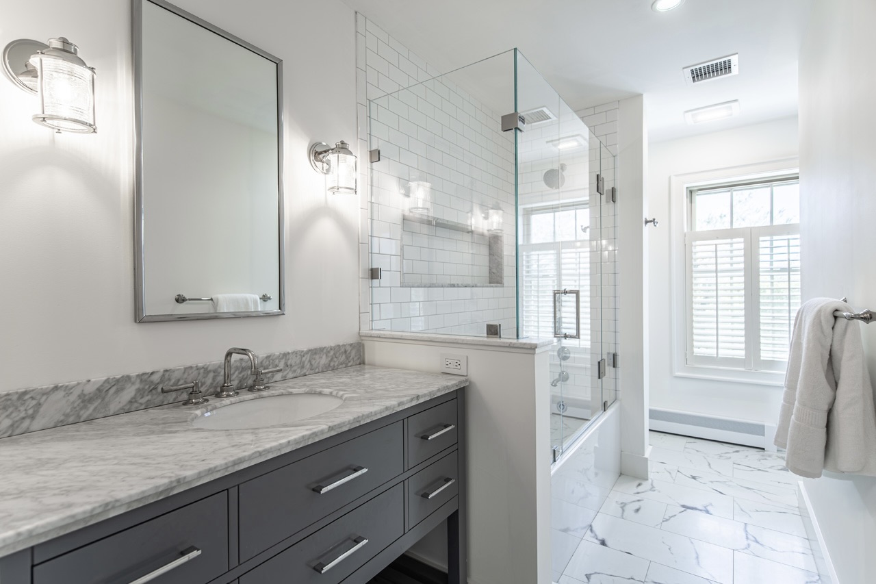 16 Somerset Road Nantucket, MA 02554 - Photo 19 of 30 a bathroom with a granite countertop sink mirror and a shower