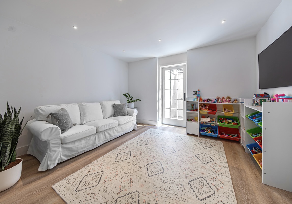 16 Somerset Road Nantucket, MA 02554 - Photo 21 of 30 a living room with furniture and a flat screen tv