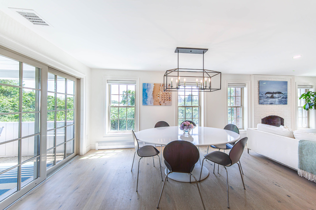 16 Somerset Road Nantucket, MA 02554 - Photo 10 of 30 a dining room with furniture a chandelier and wooden floor