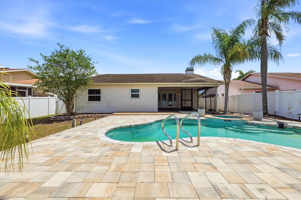 12836 Pineway Drive Largo, FL 33773 - Photo 2 of 28 a view of house with yard and entertaining space