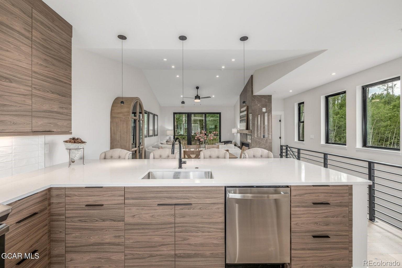 104 Saddle Mountain Camp Road Granby, CO 80446 - Photo 20 of 50 a bathroom with a sink double vanity and a mirror