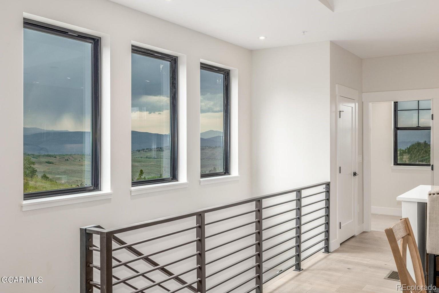 104 Saddle Mountain Camp Road Granby, CO 80446 - Photo 42 of 50 a view of a hallway with a window