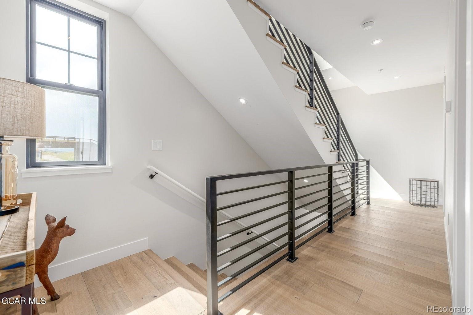 104 Saddle Mountain Camp Road Granby, CO 80446 - Photo 43 of 50 a view of entryway and hall with wooden floor