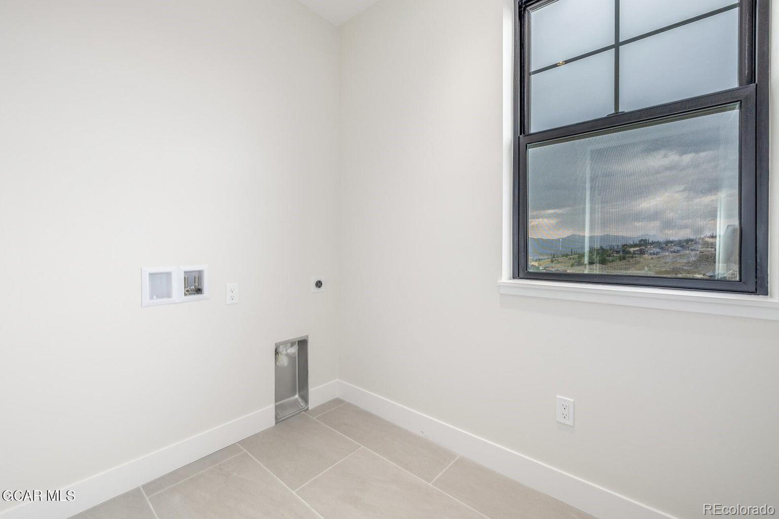 104 Saddle Mountain Camp Road Granby, CO 80446 - Photo 45 of 50 a view of an empty room with a window