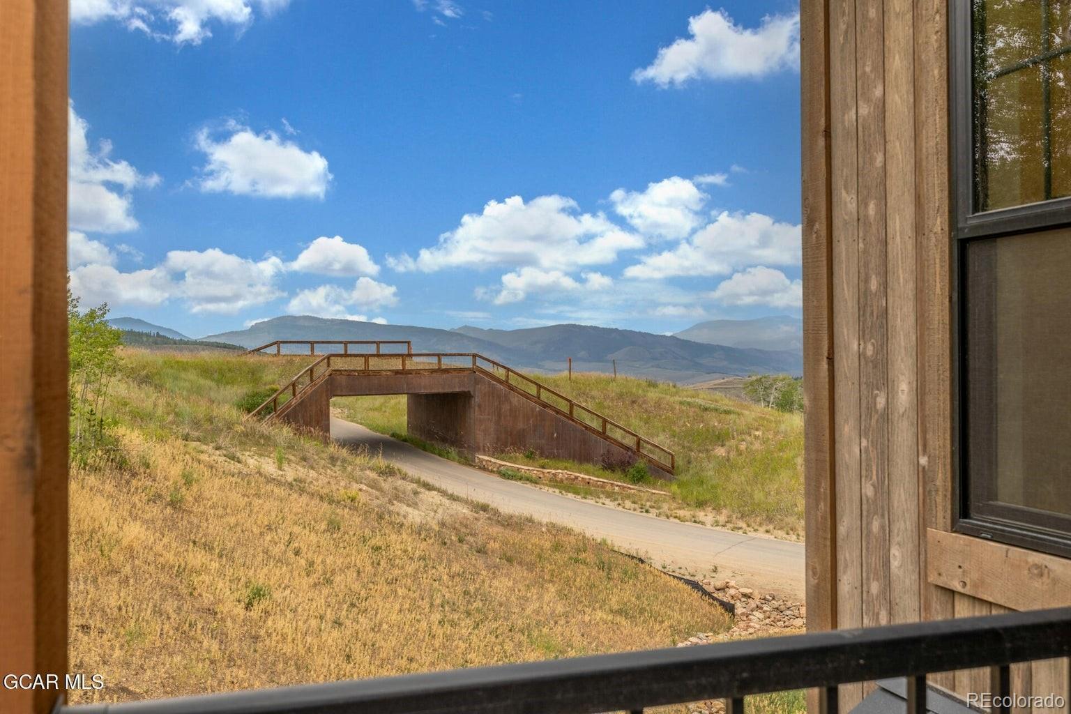 104 Saddle Mountain Camp Road Granby, CO 80446 - Photo 48 of 50 a view of a balcony with an outdoor space