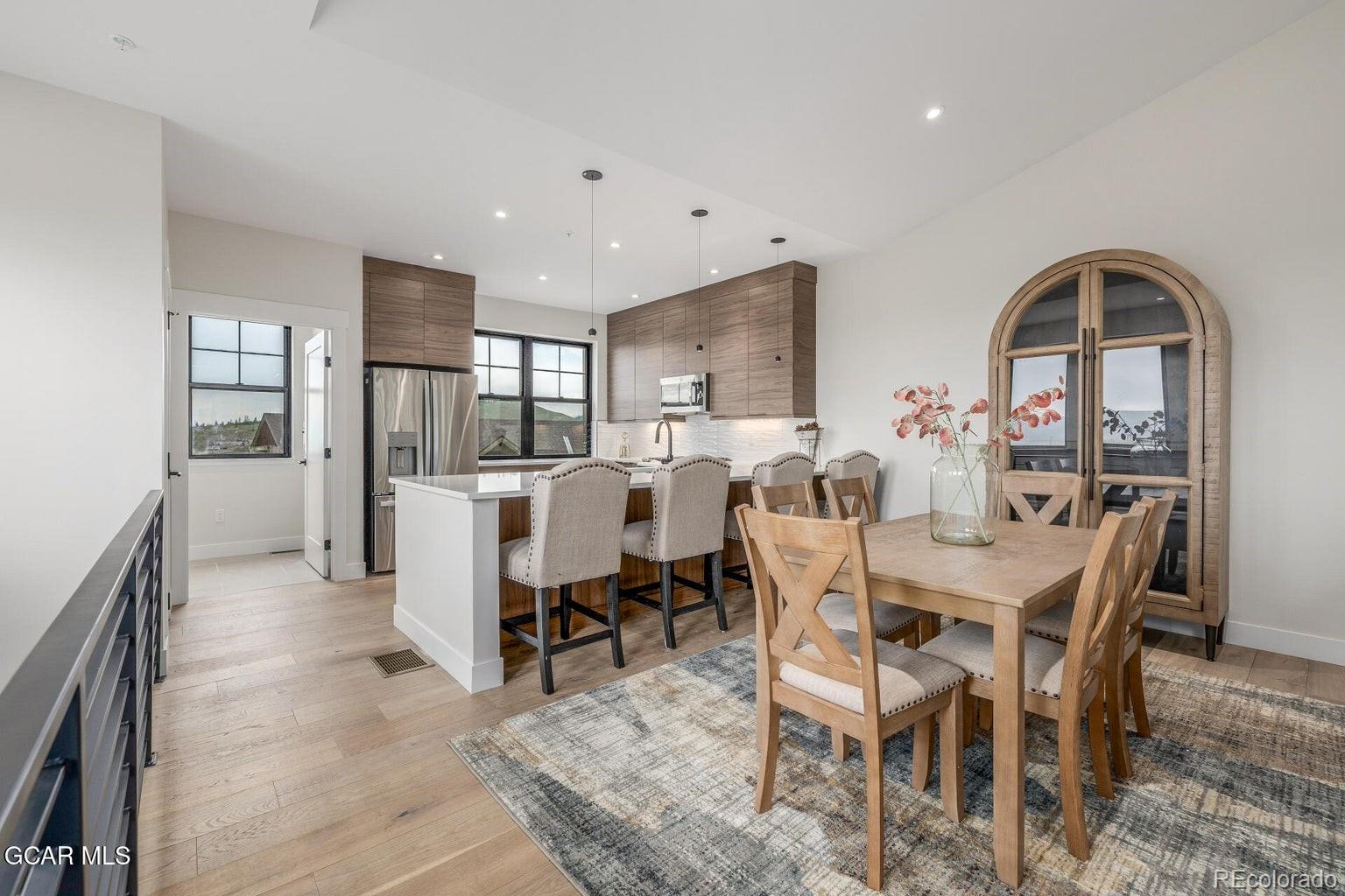 104 Saddle Mountain Camp Road Granby, CO 80446 - Photo 5 of 50 a view of a dining room with furniture