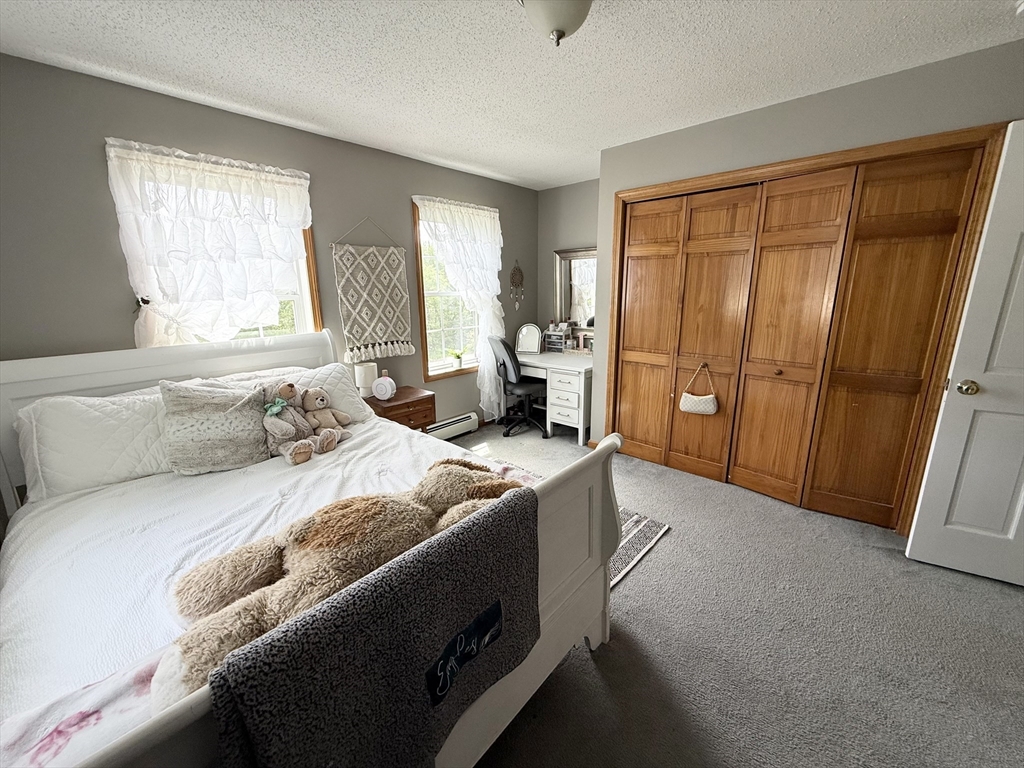 222 Bridge Street Warren, MA 01083 - Photo 26 of 40 a bedroom with a bed and a window
