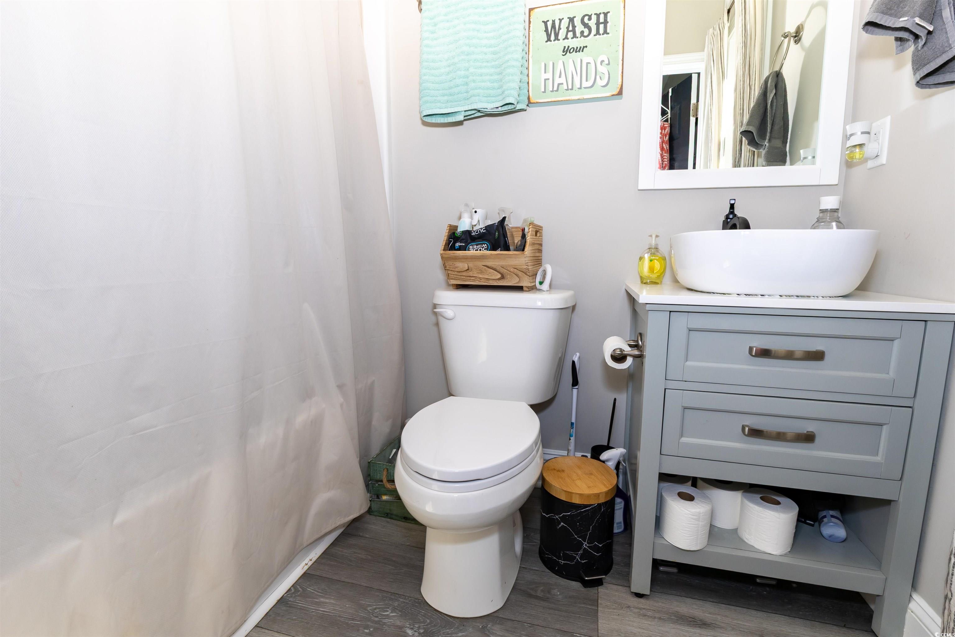 1501 Grainger Road Conway, SC 29527 - Photo 13 of 22 Bathroom featuring toilet, wood finished floors, v