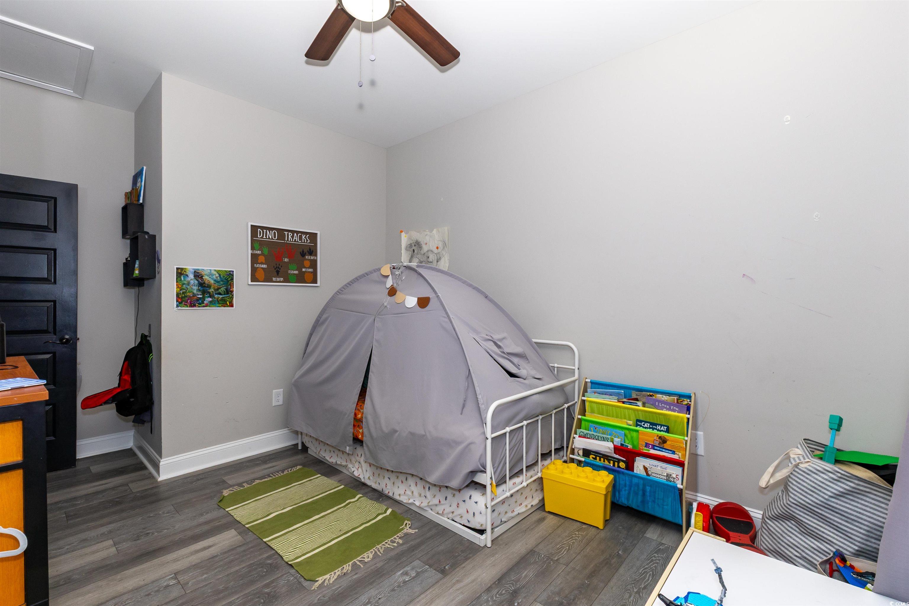 1501 Grainger Road Conway, SC 29527 - Photo 14 of 22 Bedroom featuring wood finished floors, ceiling fa