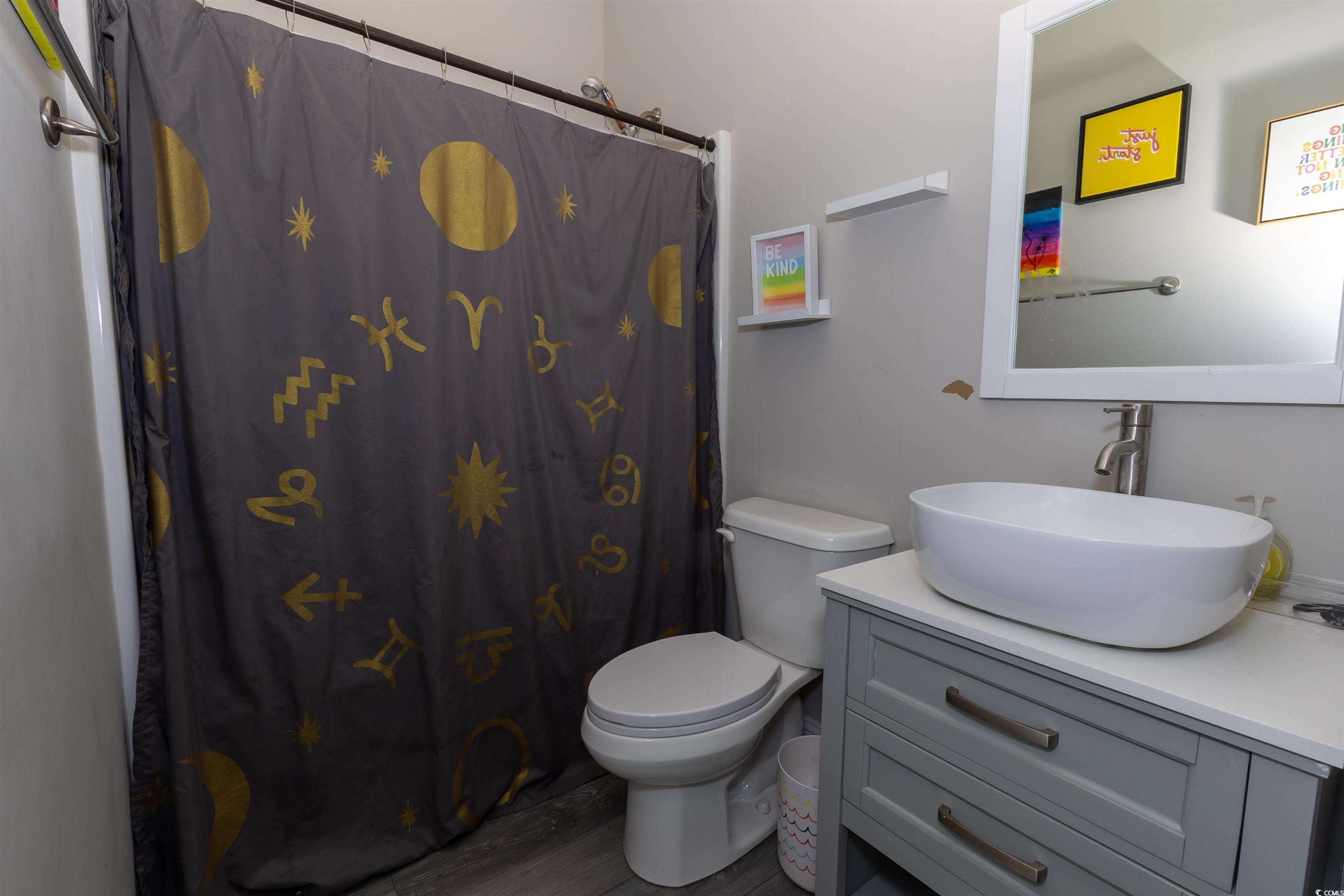 1501 Grainger Road Conway, SC 29527 - Photo 16 of 22 Bathroom featuring toilet, a shower with curtain,